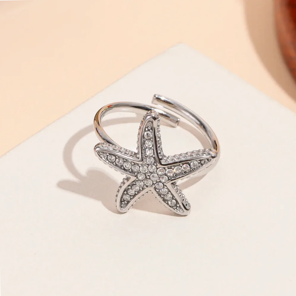 Adjustable ring starfish set with rhinestones — gift packaging presentation