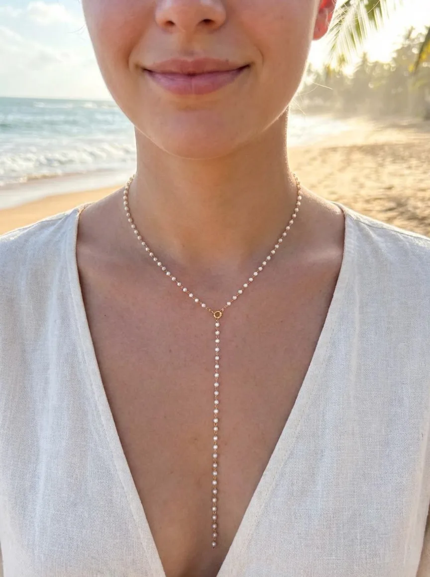 Y back necklace gold chain with small pearls worn on the ankle