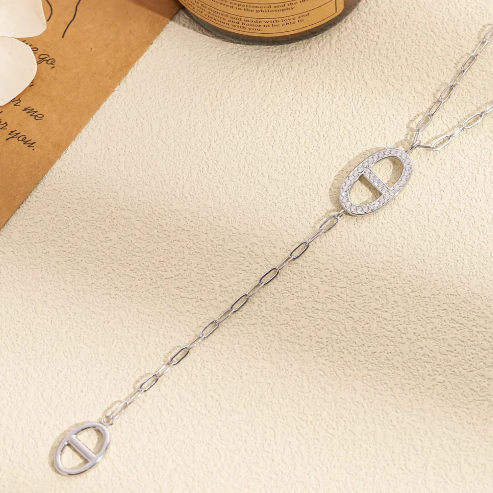 Colar Y pingente oval móvel com strass — vista de escala e dimensões