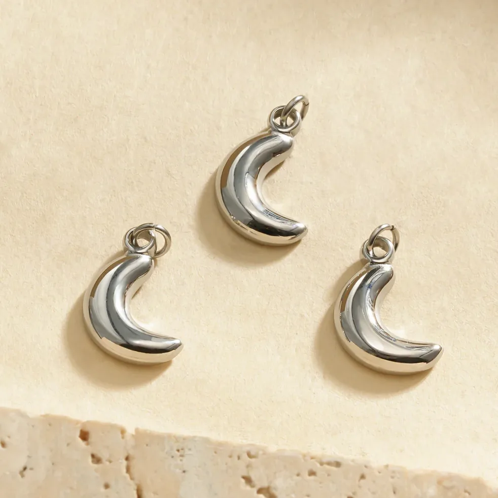Lot de 3 pendentifs demi lune argentées