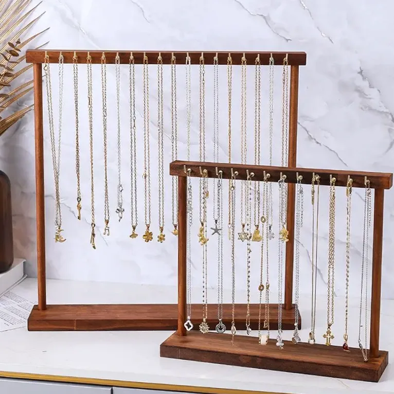 Wooden countertop display stand for necklaces and chains.